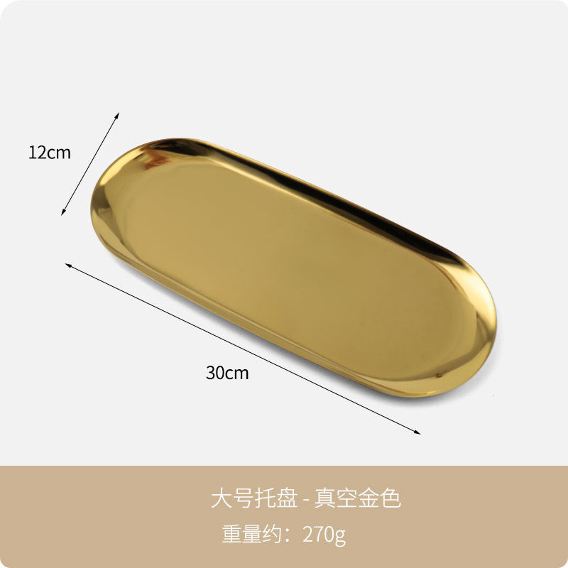 Detalhe do acabamento dourado da bandeja nórdica oval